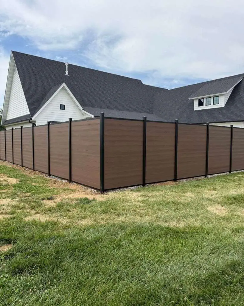 COMPOSITE fence - BROWN ON STONE